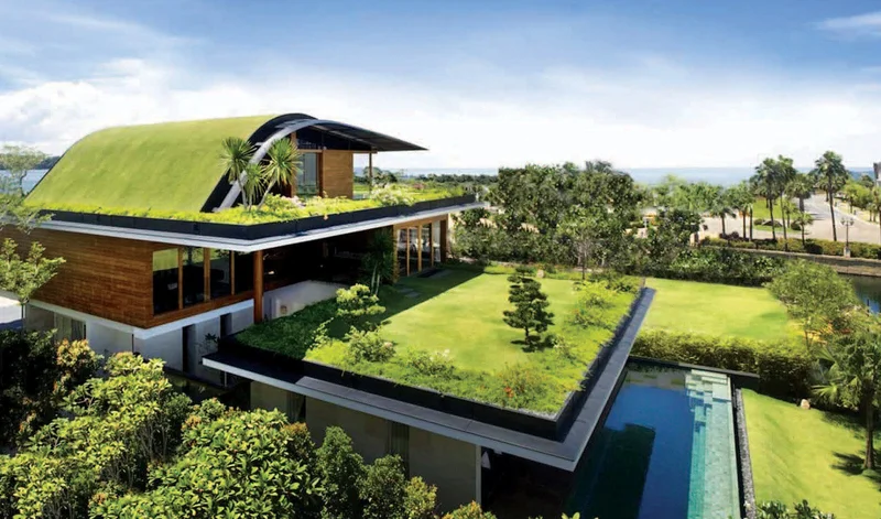 Telhado verde em um edifício urbano, com pessoas convivendo no espaço.